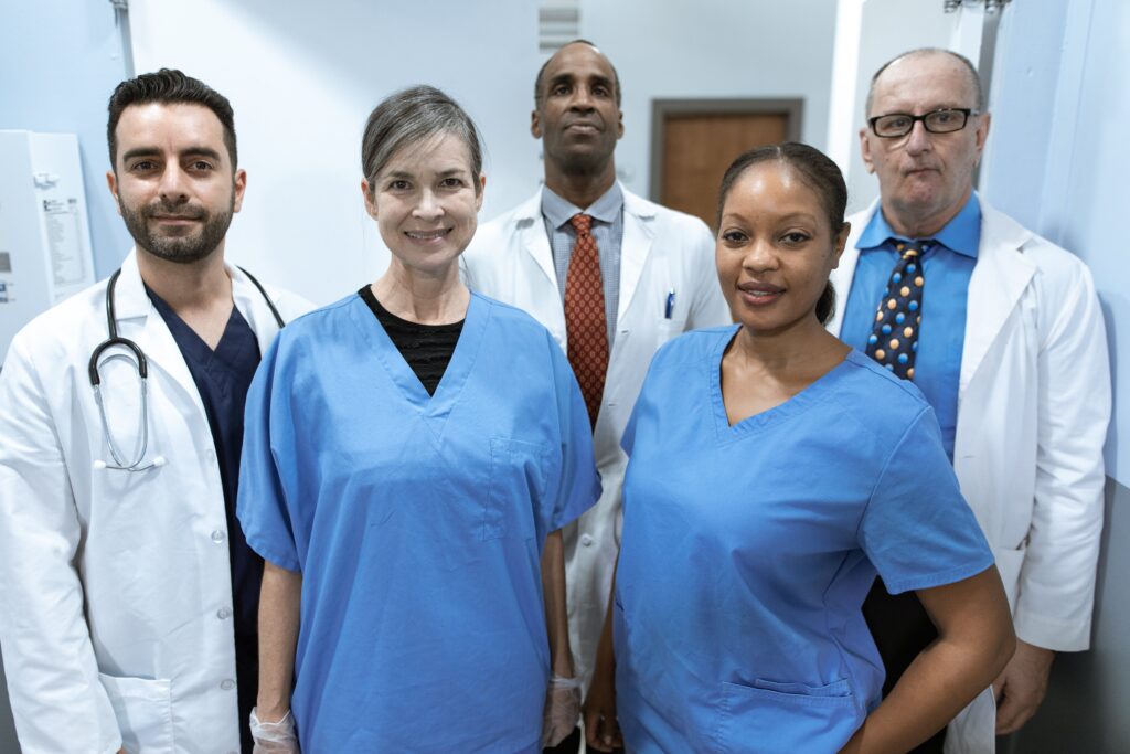A group of happy medical professionals posing for a photo